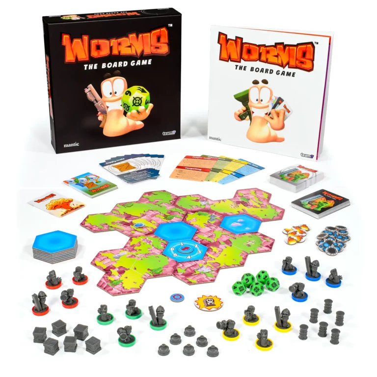 Image showing the game's box contents including tiles, dice, cards, miniatures and a rulebook.